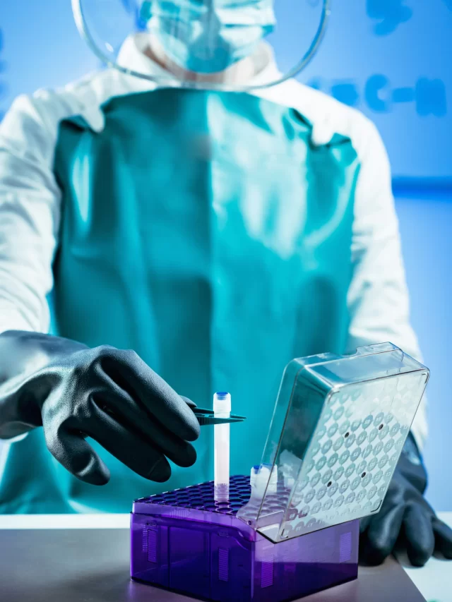 scientist-lab-coat-gloves-is-working-with-liquid