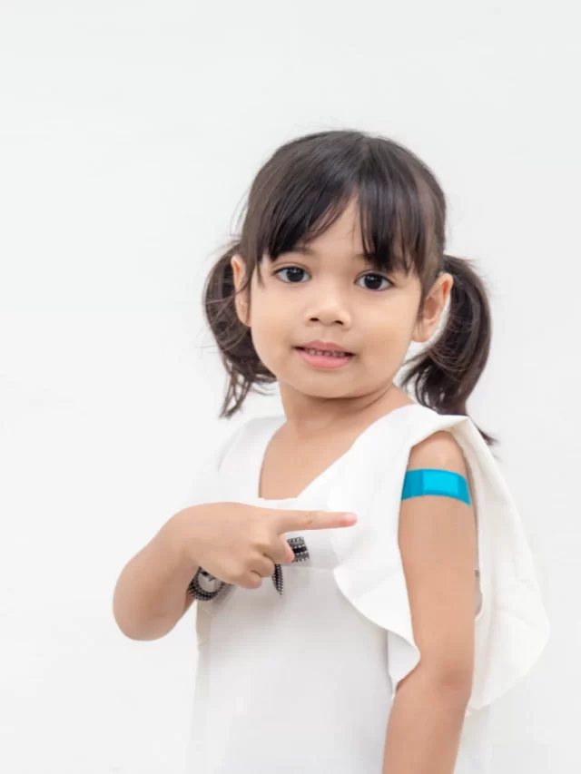 asian-little-girl-showing-his-arm-after-got-vaccinated-inoculation-child-immunization