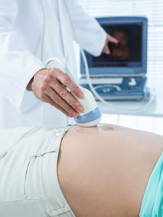 pregnant-woman-undergoing-ultrasound-test-hospital